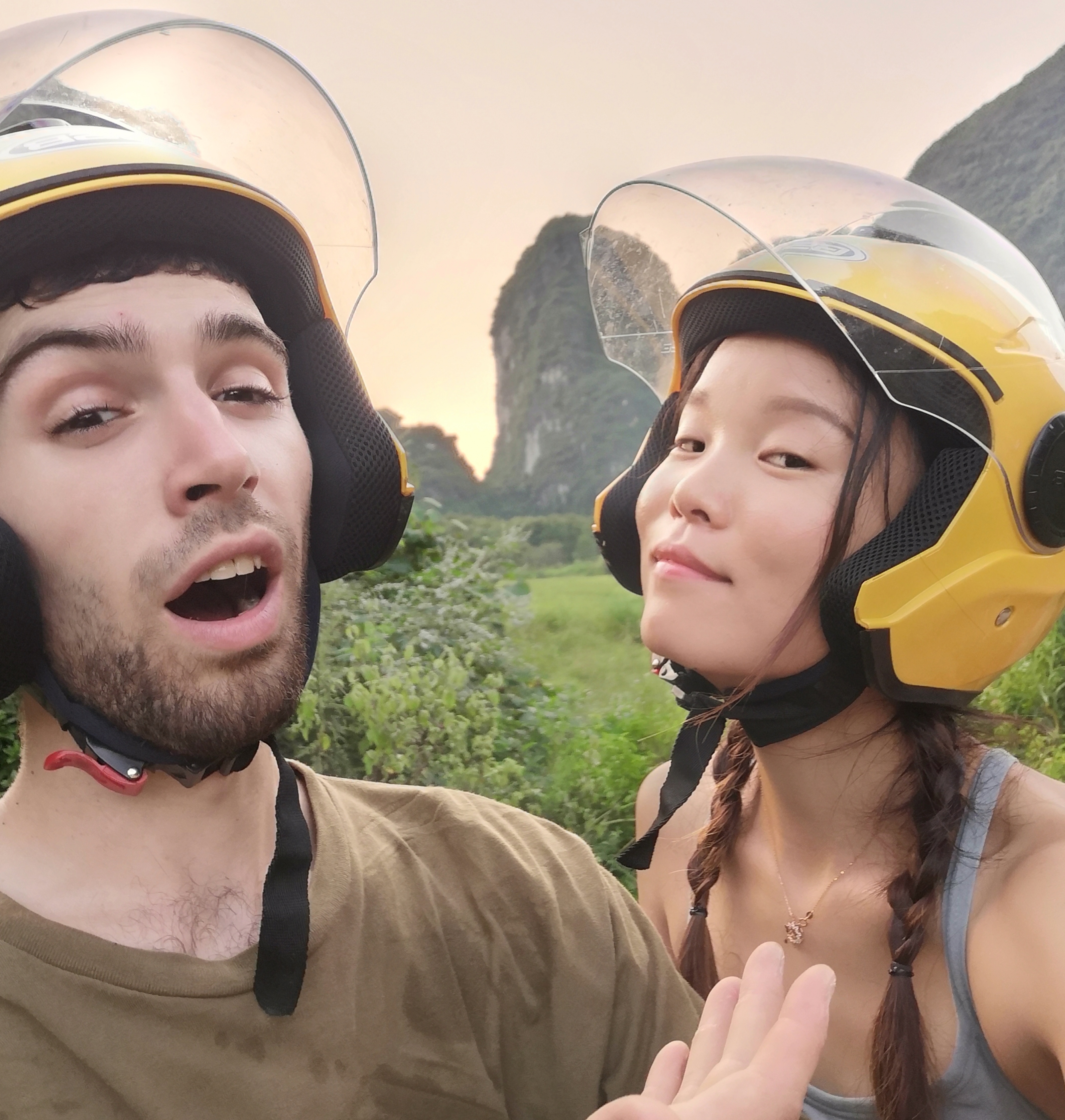 Sunsets and mountains await o' Chinese learner! Scott and Ella goofing around in helmets